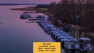 HT Houseboats - domki na wodzie - sauna, motorówka, rowerki wodne - 4hvězdičkové hotely ve městě Mielno