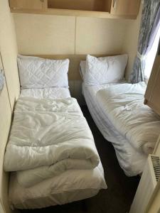 Pg34 3 BED CARAVAN ON THE GOLDEN PALM CHAPEL ST LEONARDS