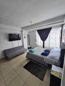 Acogedor apartamento cerca al aeropuerto y embajada americana y conecta