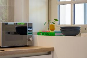 Appartements Le Mosaic - Appartement Design - 2 chambres avec parking prive a Orleans hyper centre : photos des chambres
