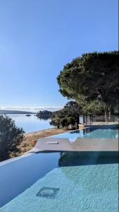 Appartements Luxueux T4 de 100m2 avec roof top, piscine et plage : photos des chambres