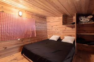 Chalets Petite maison de bois : photos des chambres