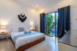 Private suite in Balinese pool villa near Echo Beach!