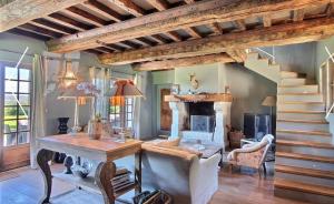 Maisons de vacances Chaumiere de charme avec piscine : photos des chambres