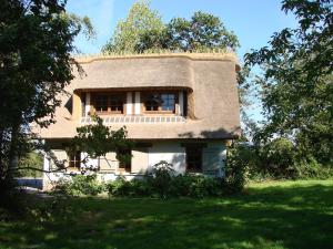 Maisons de vacances Chaumiere de charme avec piscine : photos des chambres