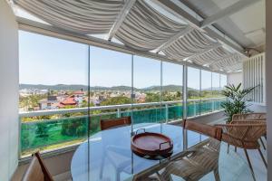 Apto no Open Shopping a 500m do mar CPJ0404