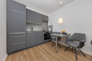 CBlue "Ferienhaus am Yachthafen - Duene"