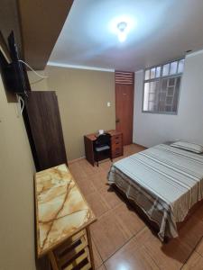 Habitación individual con baño privado en Talara centro