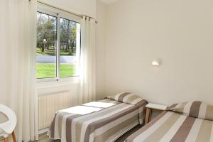 Comfort Triple Room - Disability Access room in Domaine du Pignada