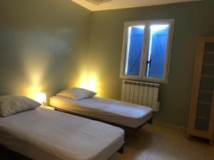 Maisons de vacances Gite les Clairieres - Piscine, Climatisation : photos des chambres
