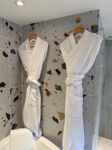 Appartements Dolcevita Suite - Signature italienne avec spa et filet : photos des chambres