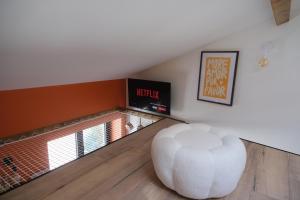 Appartements Dolcevita Suite - Signature italienne avec spa et filet : photos des chambres