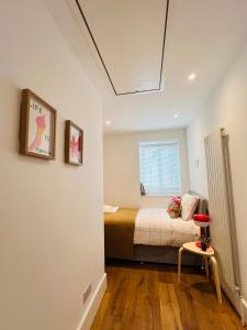 The Mews house in Muswell Hill with private parking