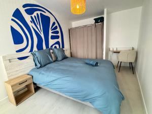 Appartements Escapade Santorini Epinal : photos des chambres
