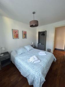 Appartements Appartement calme avec jardin : photos des chambres
