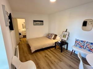 Appartements Joli Cocon au Coeur de la Petite Cite de Caractere : photos des chambres