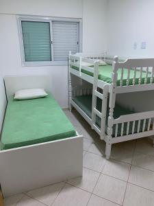 Apartamento frente mar com 3 suítes e 2 vagas de garagem