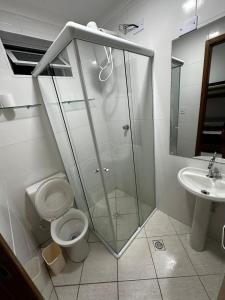 Apartamento frente mar com 3 suítes e 2 vagas de garagem