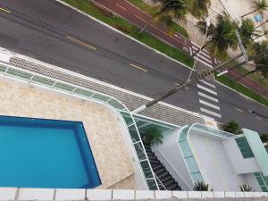 Apartamento frente mar com 3 suítes e 2 vagas de garagem