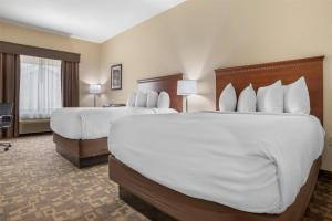 Queen Room with Two Queen Beds and Sofa Bed room in Best Western Opp Inn