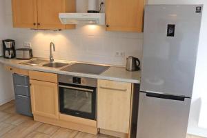 Ferienwohnung Westwind mit Terrasse direkt am Strand