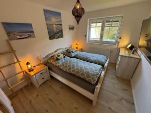 FeWo Kuestenliebe direkt am Strand mit eingez Garten