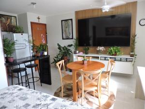 Local relaxante e bem localizado com TV Gigante