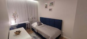 Cozy Apartment with Balcony 20 minutes from Warsaw by Noclegi Renters