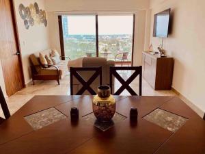 Acogedor con 2Tvs 3 albercas, gym y ludoteca