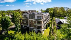 Apartamenty Sun & Snow Rozewie - basen w sezonie, plac zabaw, sauna, blisko plaży