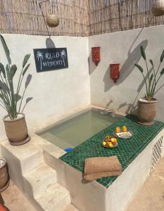 Ravissant Riad avec 4 suites et une belle terrasse avec bassin sur le toit