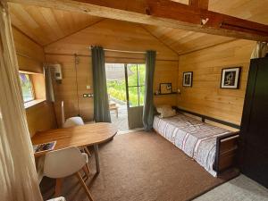 Chalets La cabane sur le lac aux Temps des Sources : photos des chambres