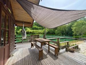 Chalets La cabane sur le lac aux Temps des Sources : photos des chambres