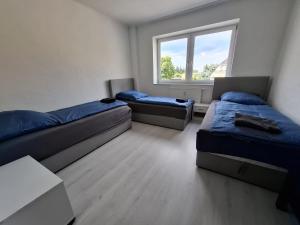 Unterkunft mit 4 Schlafzimmern - ideal gelegen bei Flughafen, Porsche & DHL - 3hvězdičkové hotely ve městě Schkeuditz