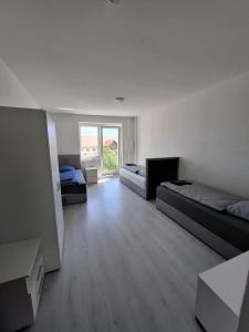 Unterkunft mit 4 Schlafzimmern - ideal gelegen bei Flughafen, Porsche & DHL