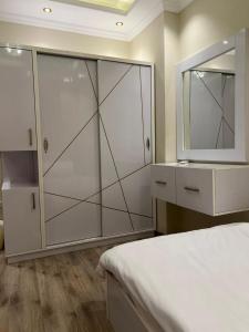 Luxury Furnished Duplex Apartment with a Private Garden