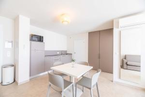 Appartements Residence hoteliere D-Amare : photos des chambres