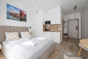 Apartament pod Żurawiem Chmielna 110 by Alqueen Apartments