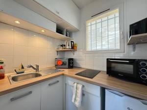 Appartements L-Ancrage - TV, Vue sur le port, Wi-Fi : photos des chambres