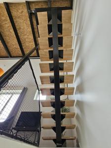 Appartements Le Loft de Genas - la Bastide, le Chalet, le Loft, le Mas, la Paillote : photos des chambres