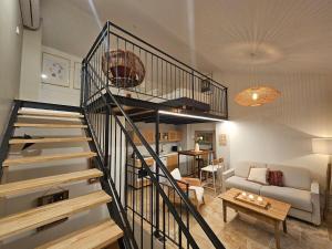 Appartements Le Loft de Genas - la Bastide, le Chalet, le Loft, le Mas, la Paillote : photos des chambres