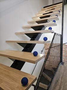 Appartements Le Loft de Genas - la Bastide, le Chalet, le Loft, le Mas, la Paillote : photos des chambres