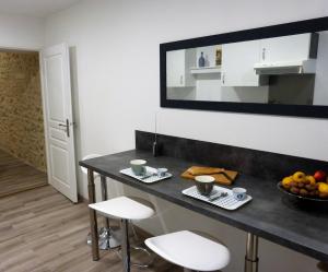Appartements Le Quarante : photos des chambres