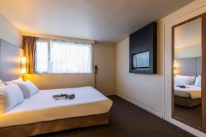 Hotels Campanile Evry Est - Saint Germain les Corbeil : photos des chambres