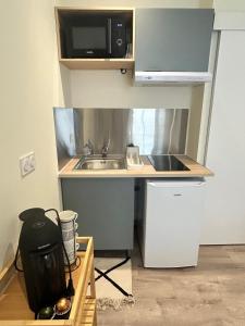 Appartements Studio Centre-ville : photos des chambres