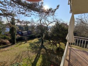 Charming Apartment with a Tranquil Balcony Garden View