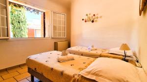 Villas Villa Lucendiluna 14 personnes piscine plage 5min le paradis : photos des chambres