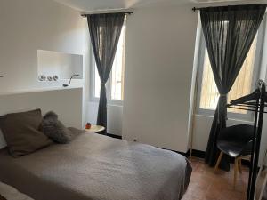 Appartements Maison 217 : photos des chambres