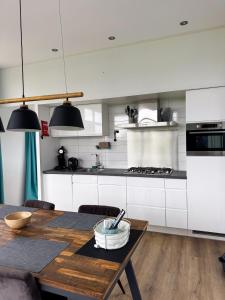 Marina Strandbad Chalet IJssel Oase mit Zaun Haus Nr 77