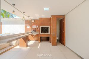 Apartamento Moderno a 280m da Praia AST0103